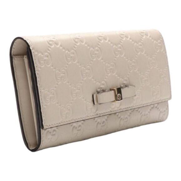 GUCCI Guccisima White Calfskin
Leather Bow Wallet Full Inclusion - Picture 11 of 13